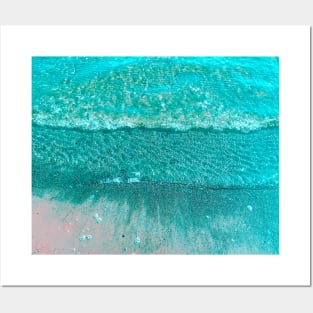 Ocean waves on a sand Posters and Art